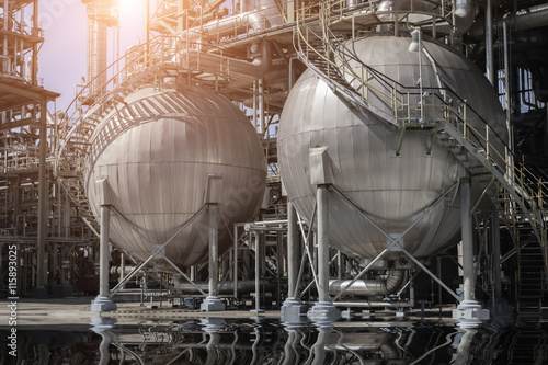 A large oil-refinery plant with Liquefied Natural Gas (LNG) storage tanks.