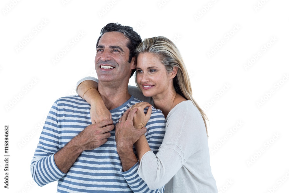 Romantic couple embracing against white background Romantic couple embracing against white background