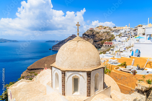 Church dome in beautiful Firostefani village and sea view, Santorini island, Greece
