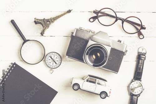 Travel accessories concept background with camera, eyeglasses, c