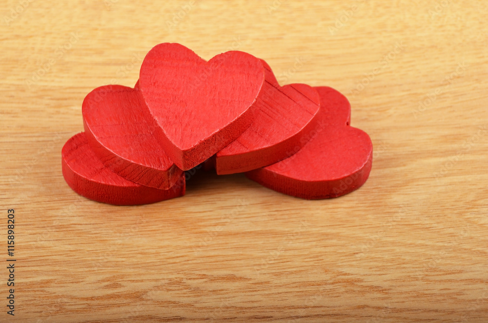 Heart on wooden background