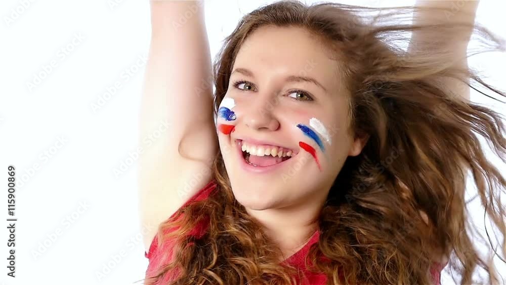Girl with Russian flag on her face smiling, slow motion Girl with Russian flag on her face smiling, slow motion