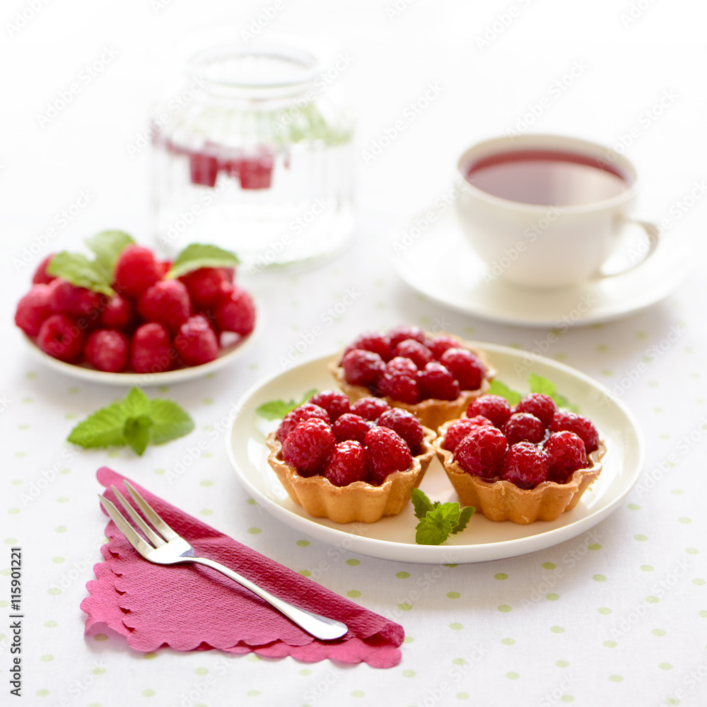 Fruit raspberry cakes on a table Fruit raspberry cakes on a table