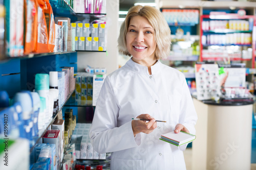 Pharmacists working in modern farmacy