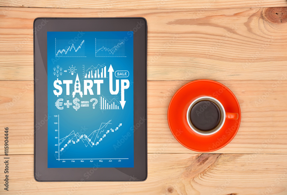 Naklejka premium tablet with start up scheme