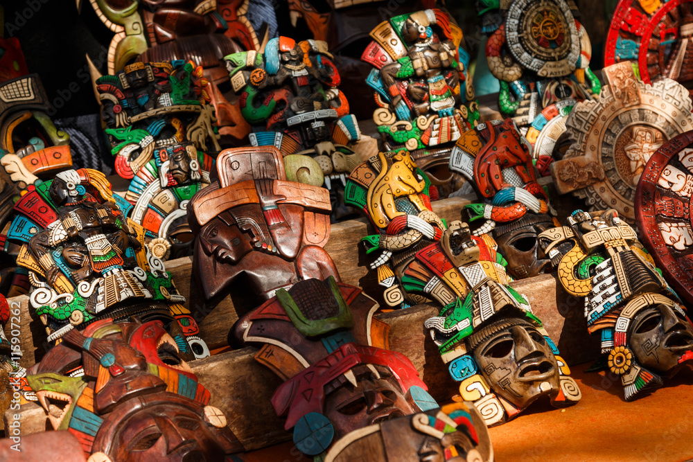 Different wooden souvenirs at the local Mexican market