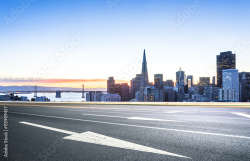 empty road with cityscape and skyline of san francisco at sunris