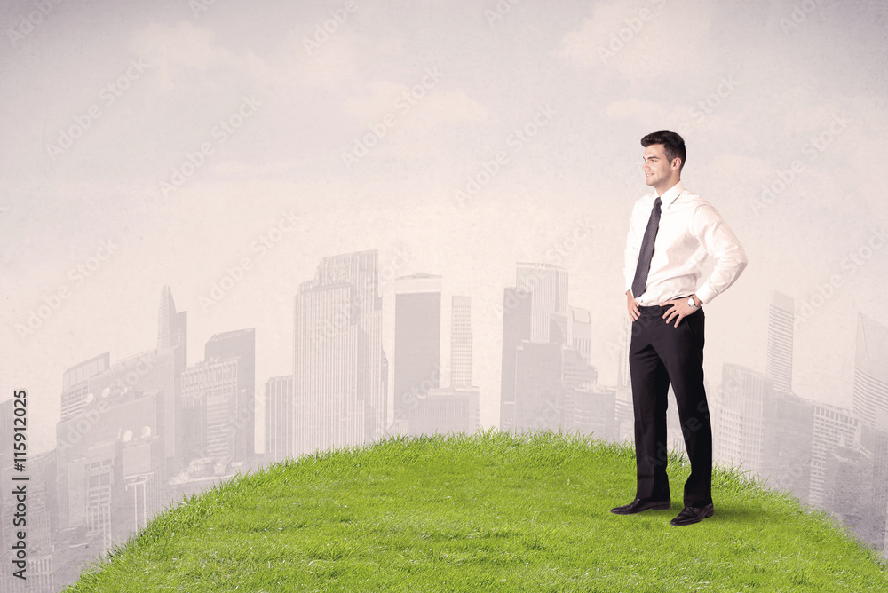 man standing in front of city landscape man standing in front of city landscape