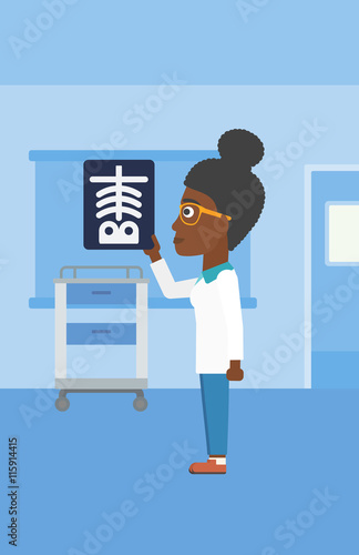 Doctor examining radiograph.