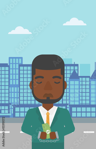 Businessman handcuffed for crime.