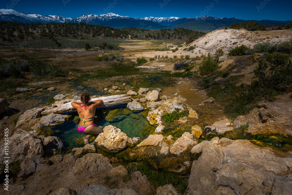 Topless Woman relaxing in Travertine Hot Spring pool Bridgeport California USA 