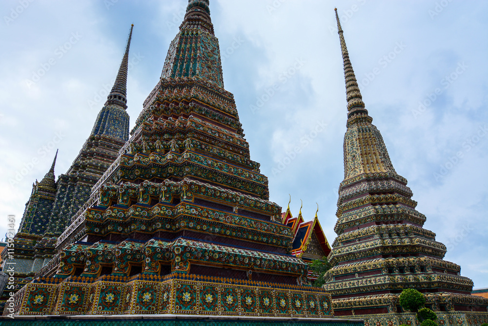 Giant chedis built for Thai kings at the historic Wat Pho in Bangkok, Thailand