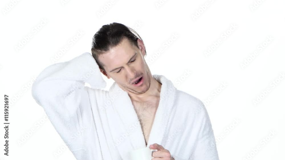 Man yawns, scratches his hair and drinking coffee. Black. Close up Man yawns, scratches his hair and drinking coffee. Black. Close up