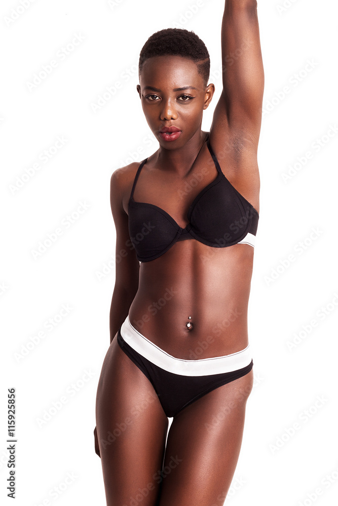 Gorgeous african model posing while wearing sporty lingerie Stock Photo