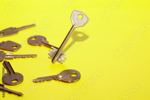 Keys Concept On Yellow
