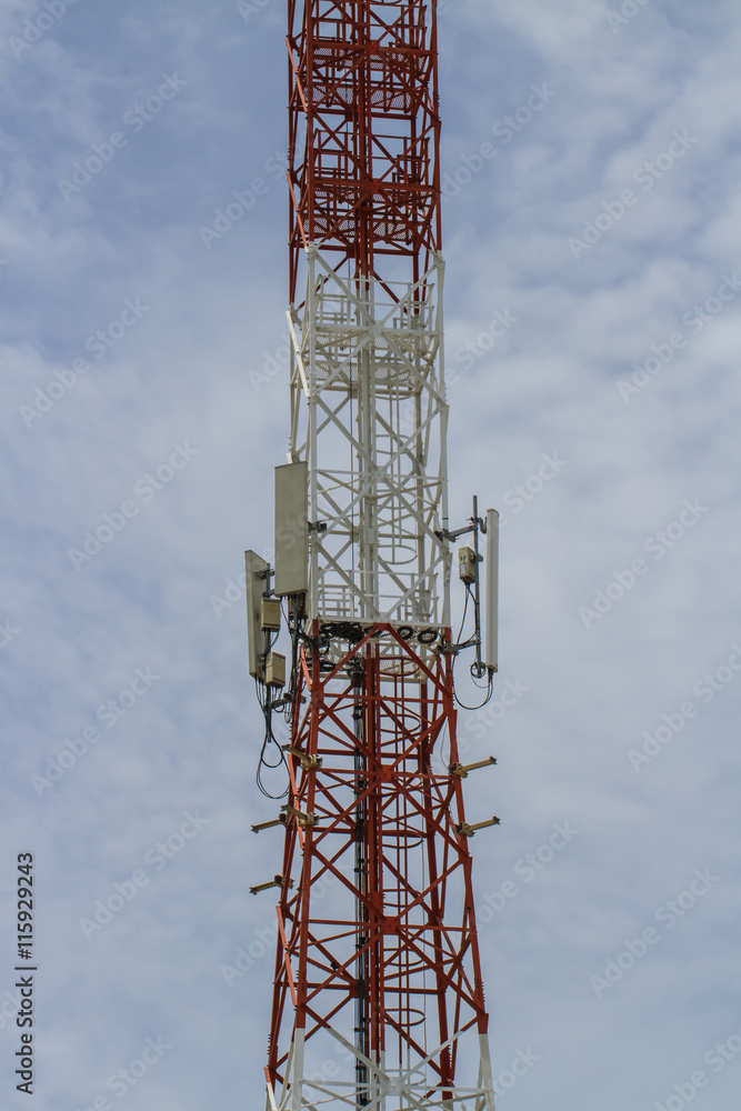 Telecommunications tower. Mobile phone base station with blue sky Telecommunications tower. Mobile phone base station with blue sky