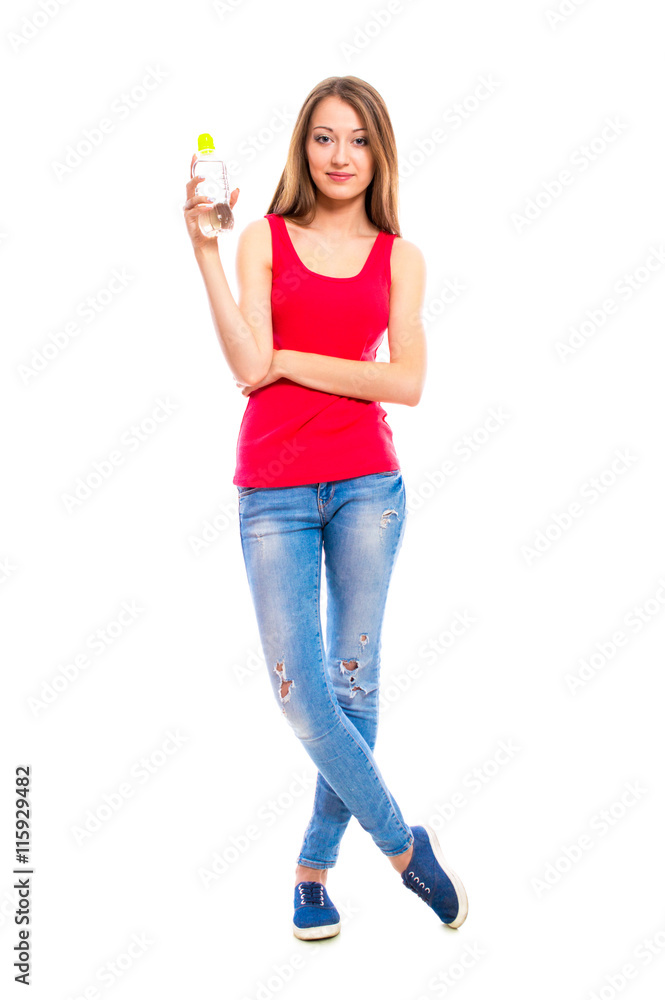 Young attractive woman in blue jeans isolated on white background ...
