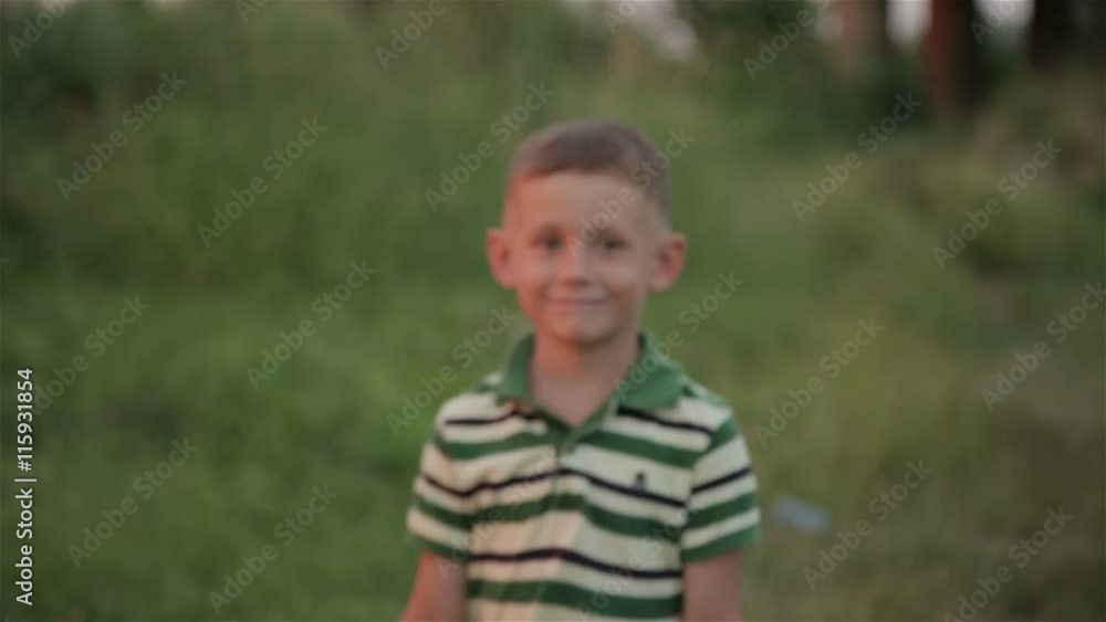 Boy playing outdoors Boy playing outdoors