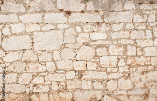 Old wall made of the  stone