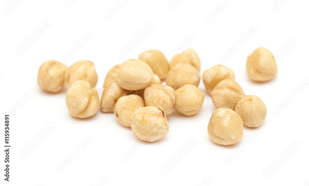 handful of shelled hazelnuts isolated on white handful of shelled hazelnuts isolated on white