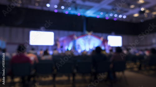 people in conference exhibition hall - blur for use as backgroun © 88studio