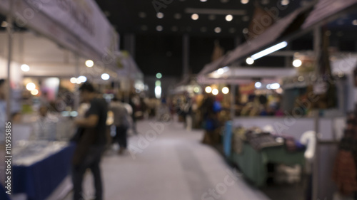 people shopping in exhibiton trade fair - blur