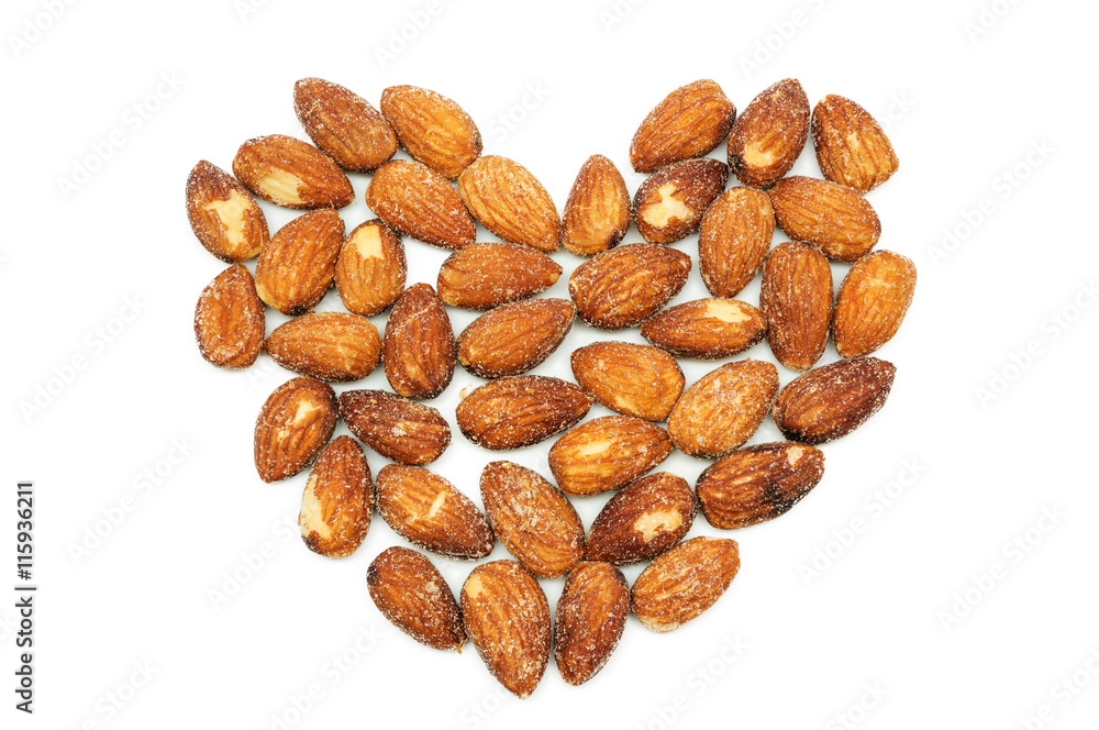 Almonds baking with salt on white background. Almonds baking with salt on white background.