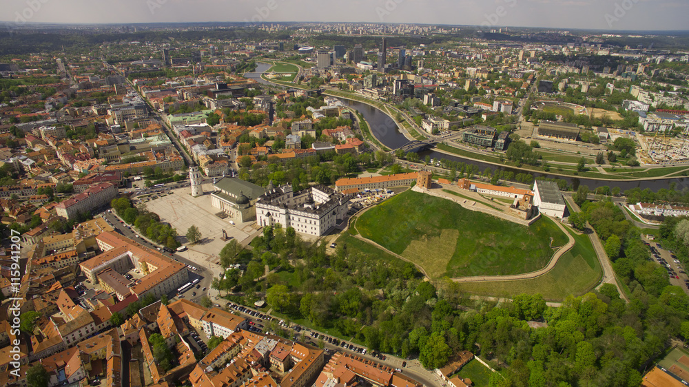 AERIAL. Beautiful sunny day aerial panorama shot of old town in