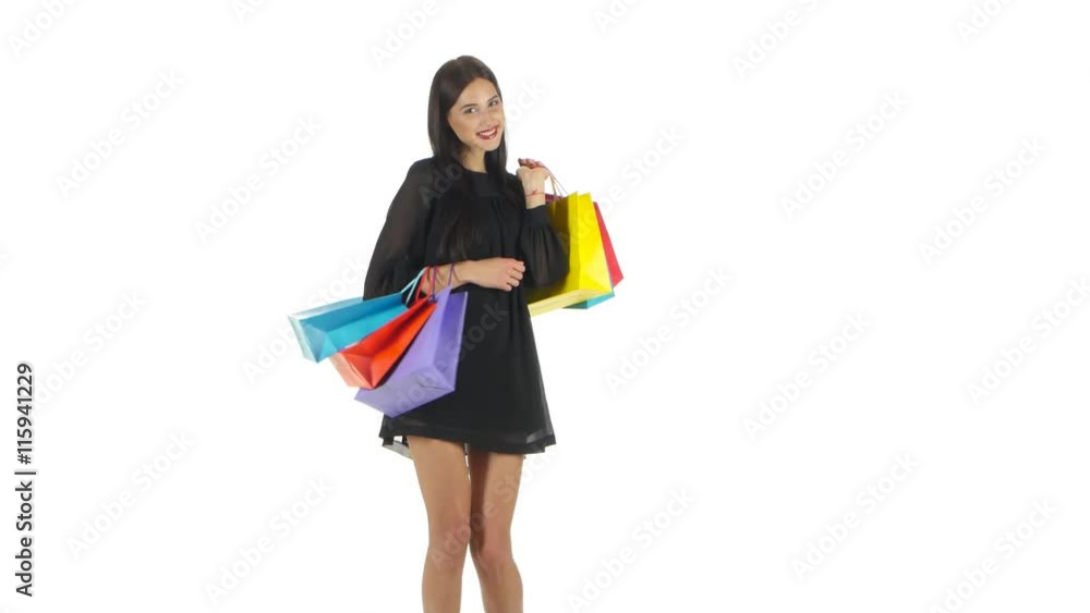 Woman holding shopping bags,. White Woman holding shopping bags,. White