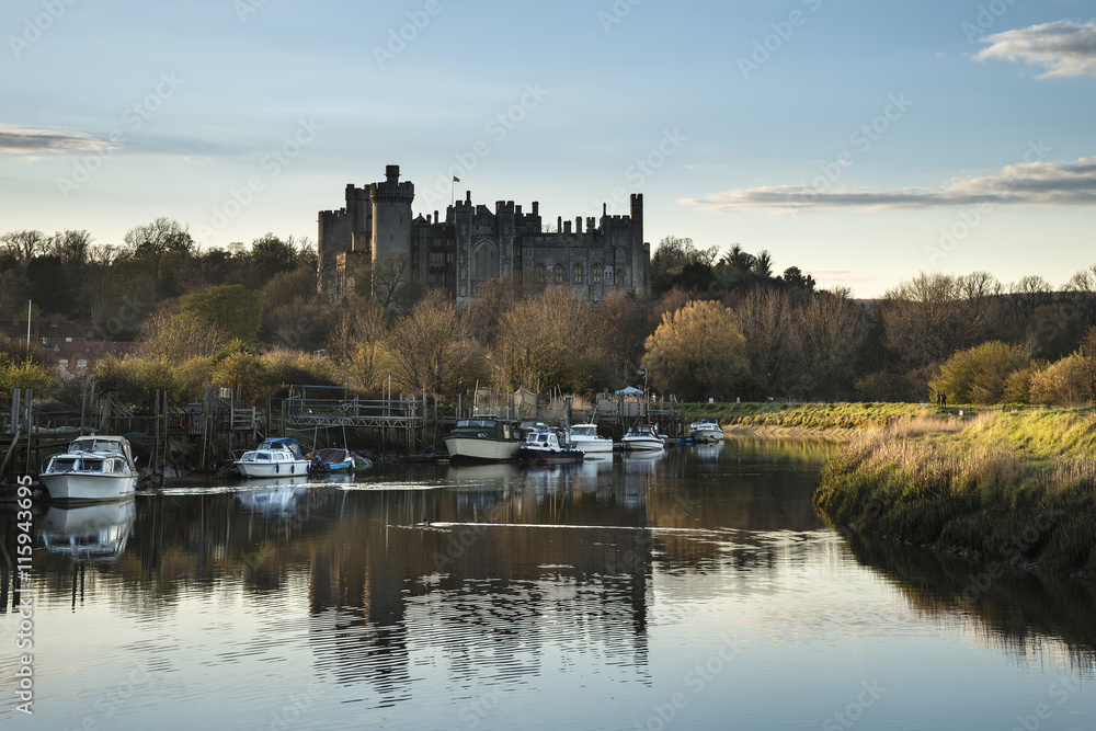 Landscape image of old medieval Castle viewed across River at su Landscape image of old medieval Castle viewed across River at su