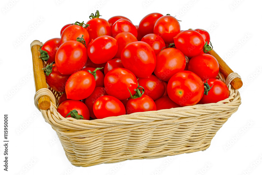 Fresh red tomatoes in wicker basket Fresh red tomatoes in wicker basket