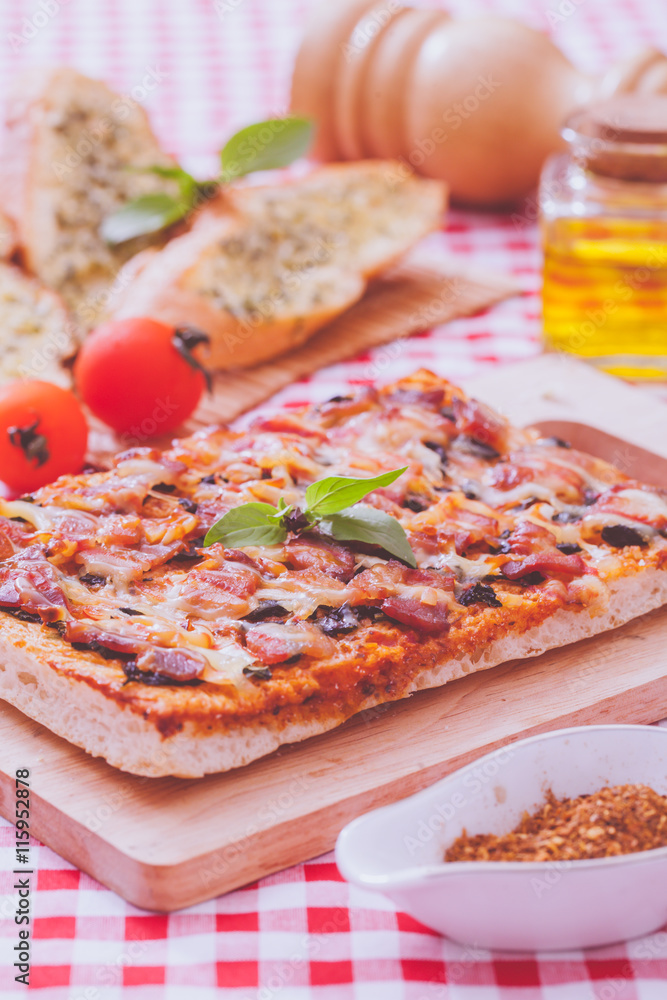 Homemade bacon pizza with garlic bread Homemade bacon pizza with garlic bread