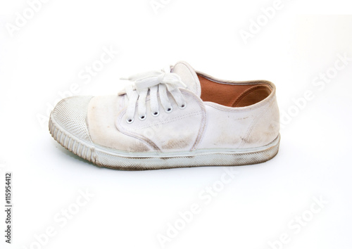 dirty sneakers isolated on a white background © hideto111