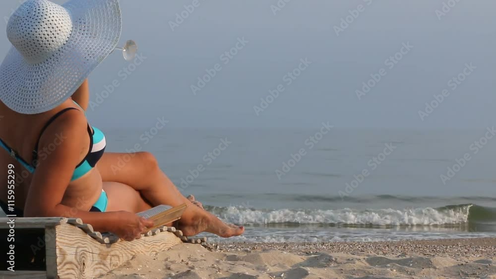 custom made wallpaper toronto digitalBeautiful girl sunbathing reading a book and drinking wine.
