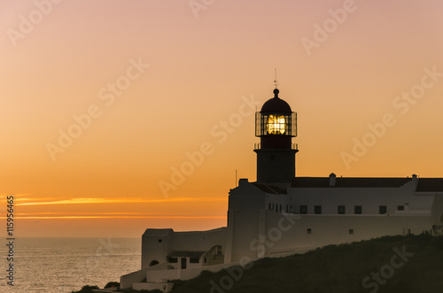 view of the lighthouse during sunset, symbol of guard