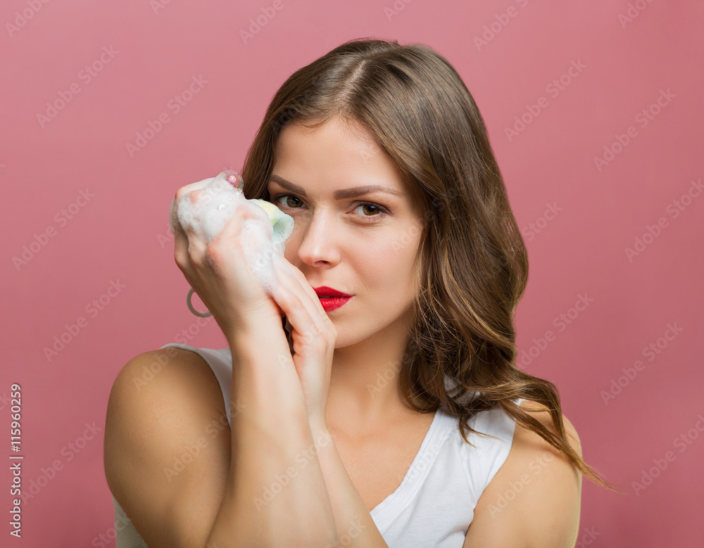 Beautiful woman with a cleansing foam Beautiful woman with a cleansing foam