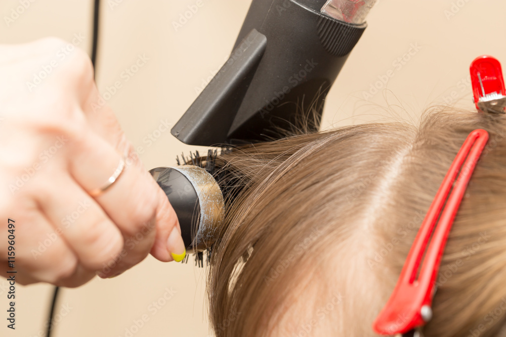 Fototapeta premium blow-drying in a beauty salon