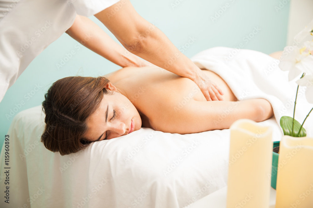 Beautiful girl getting a back massage