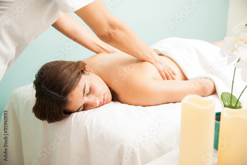Beautiful girl getting a back massage