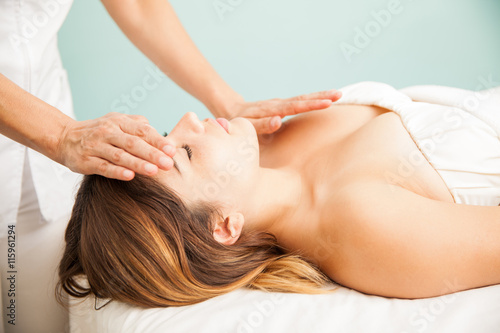 Woman getting positive energy at a spa