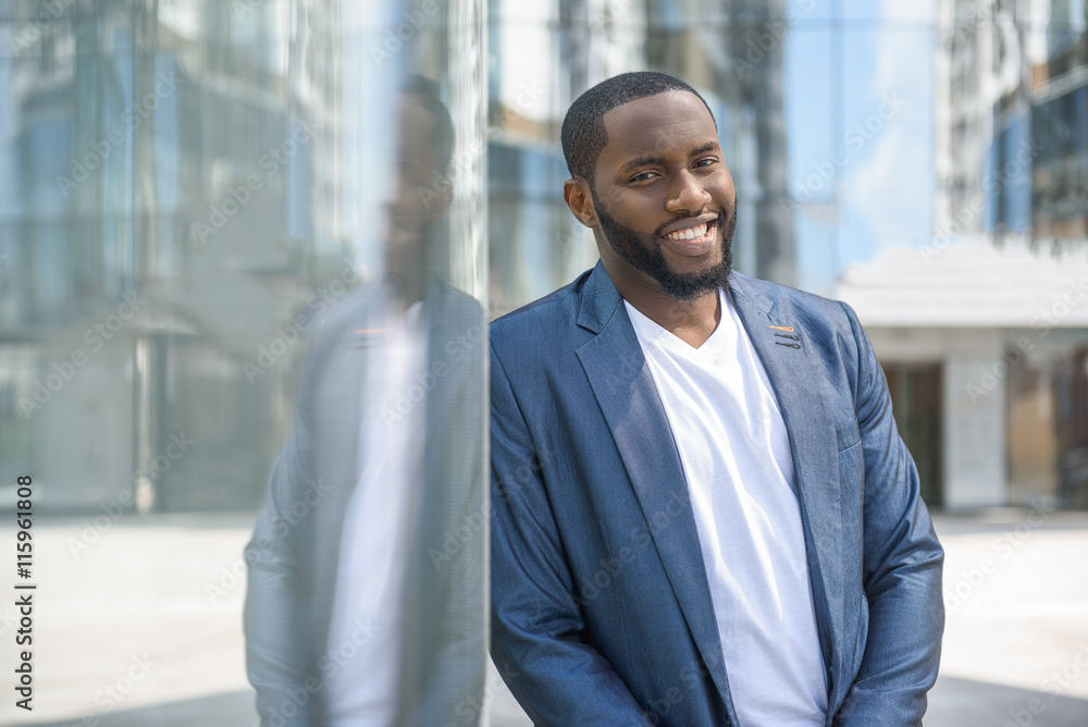 Attractive African businessman resting after work Attractive African businessman resting after work