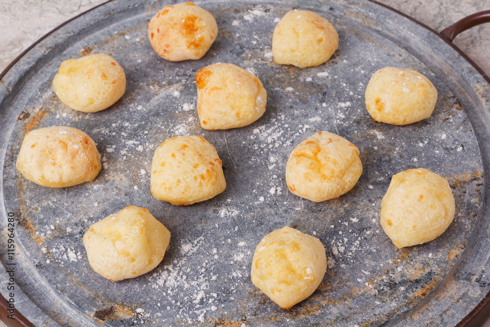 Brazilian snack cheese bread (pao de queijo) on oven-tray Brazilian snack cheese bread (pao de queijo) on oven-tray