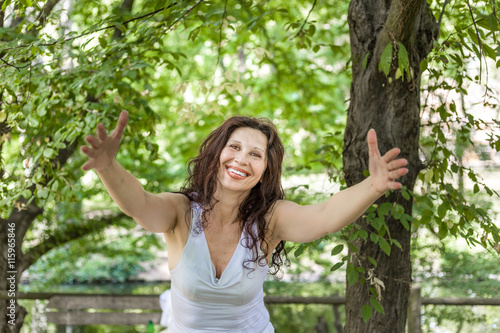 menopausal woman offers a hug