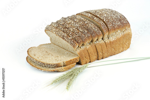 whole grain wheat bread and wheat isolated on white background