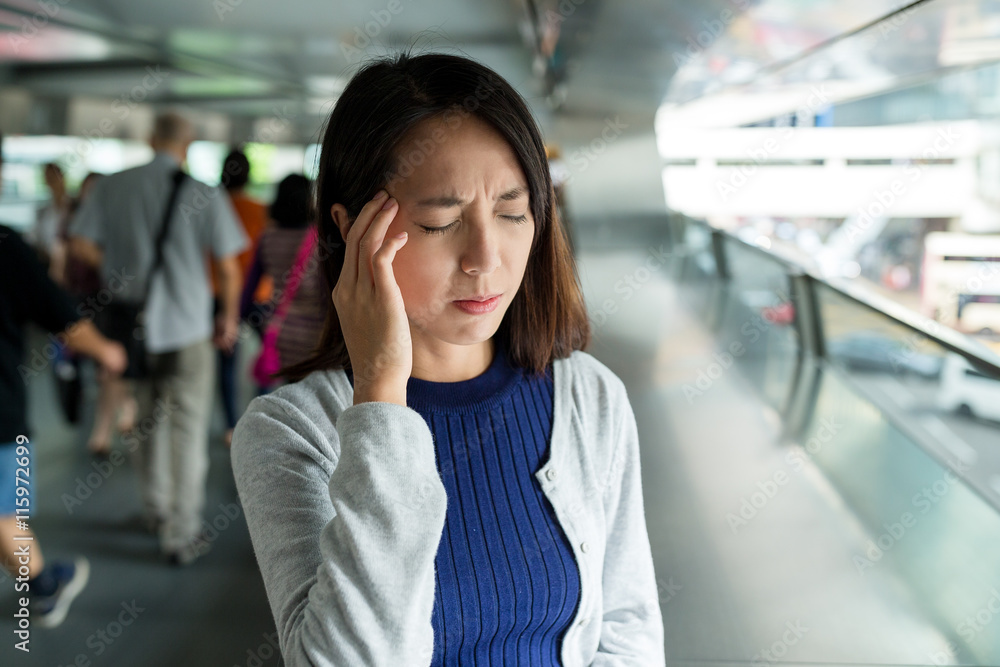 Woman suffer form headache at outdoor Woman suffer form headache at outdoor