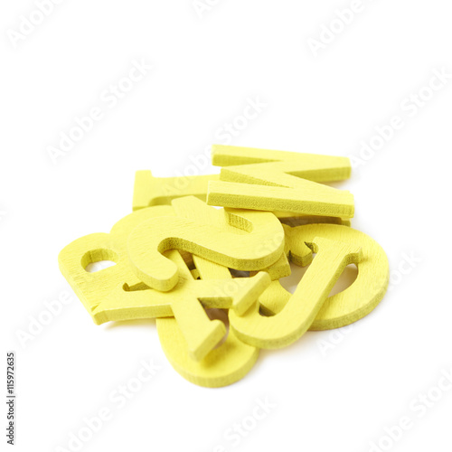 Pile of painted wooden letters isolated