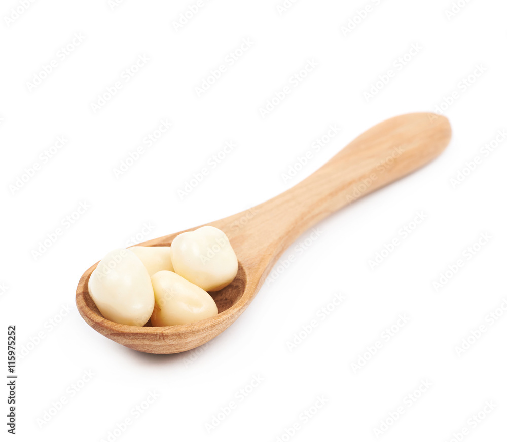 Spoon of chocolate candies isolated Spoon of chocolate candies isolated