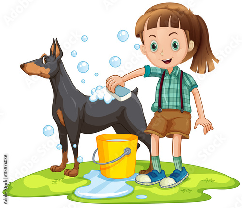 Little girl giving bath to pet dog