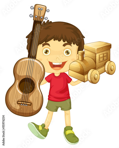 Little boy holding wooden toys