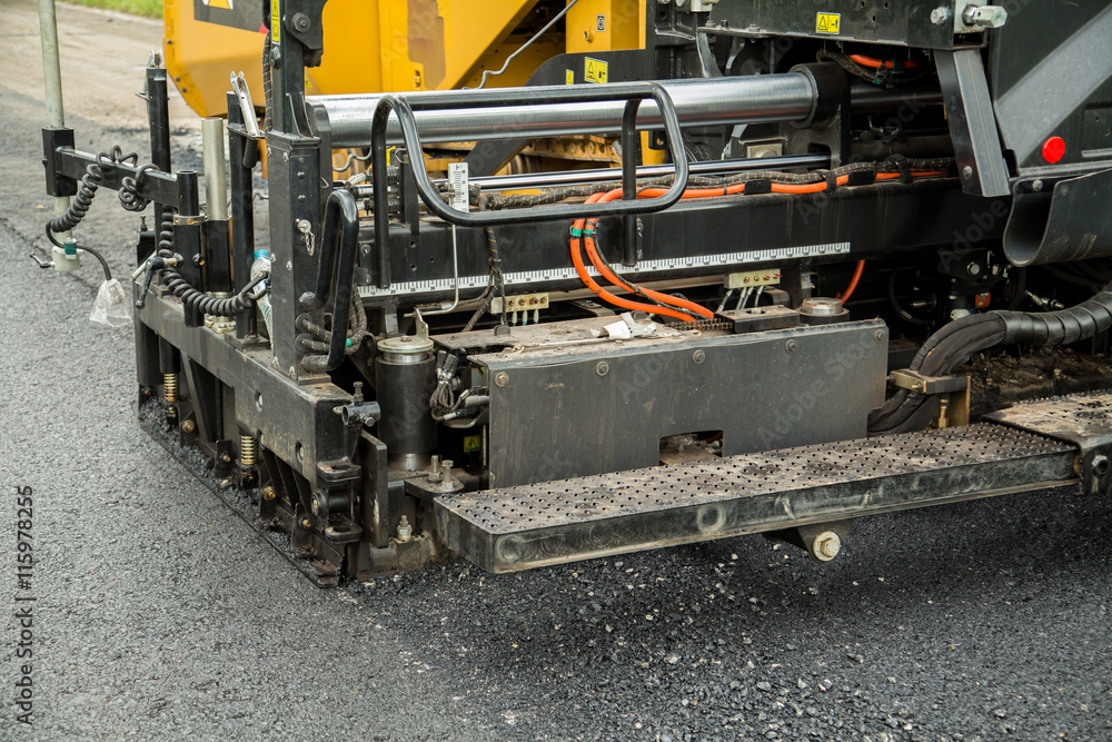 Road construction works with roller compactor machine and asphalt finisher Road construction works with roller compactor machine and asphalt finisher